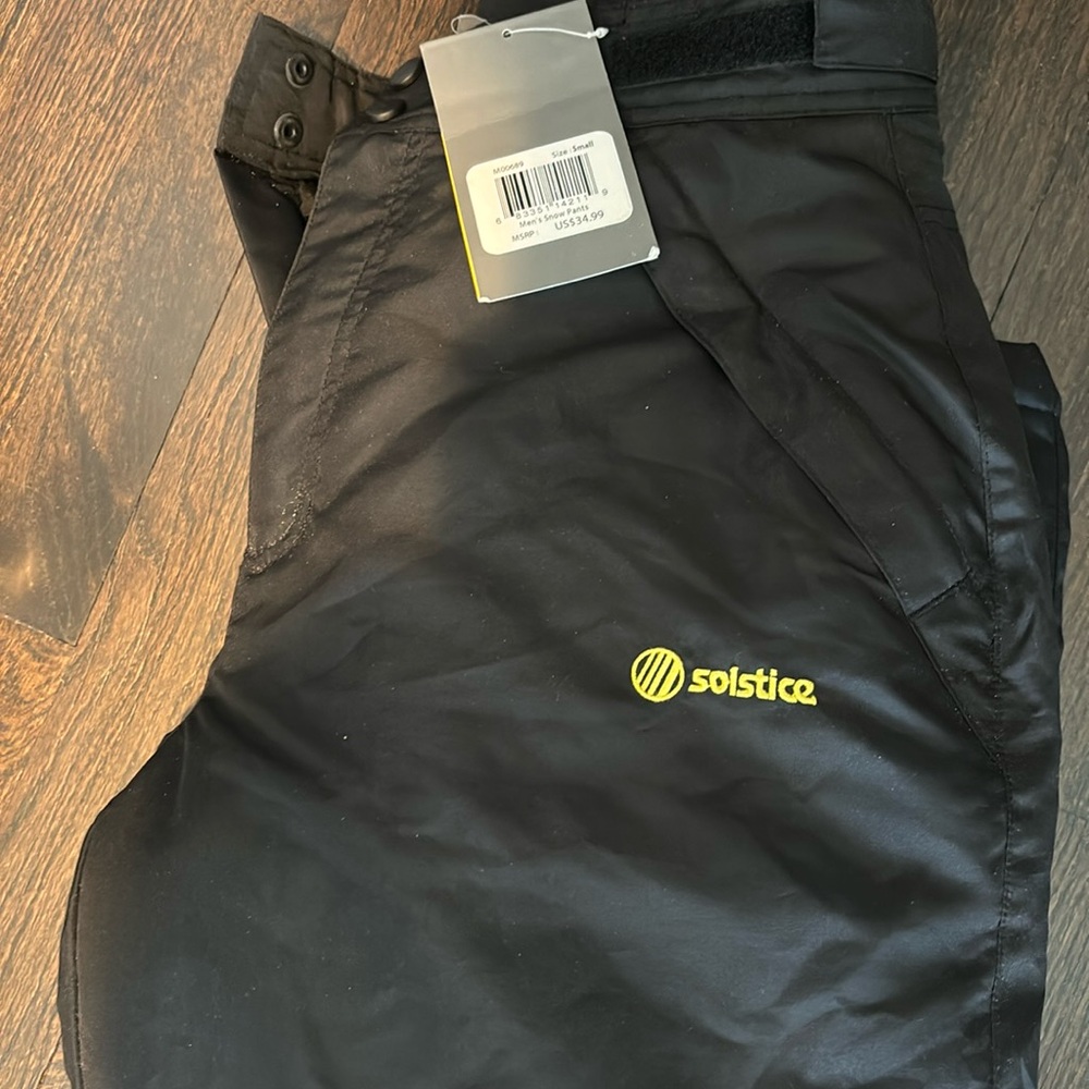 Never worn tags attached!